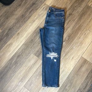 American Eagle Mom Jean with distressed knee and back of ankle